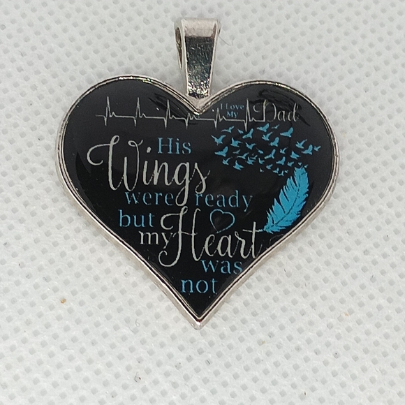Jewelry - 6/$25
Heartfelt Memorial Pendant with Blue and Black Design